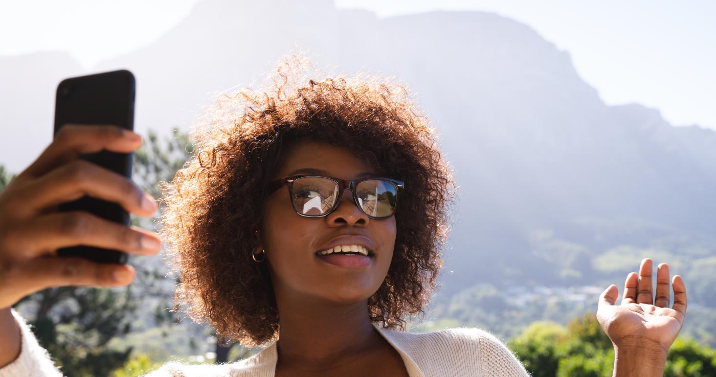 A woman taking a selfie.